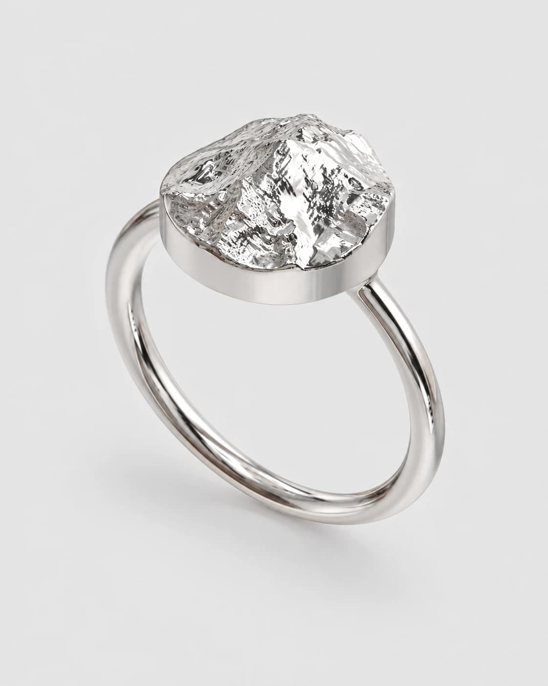Classic Disc ring in sterling silver with a raised landscape surface